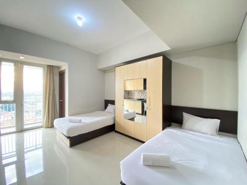 Hegarmanah Apartment | Private and Spacious Studio Room at Skyland City Jatinangor By Travelio