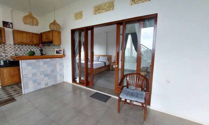 Melayang House | Private cozy bedroom with a spacious shared deck and spectacular view