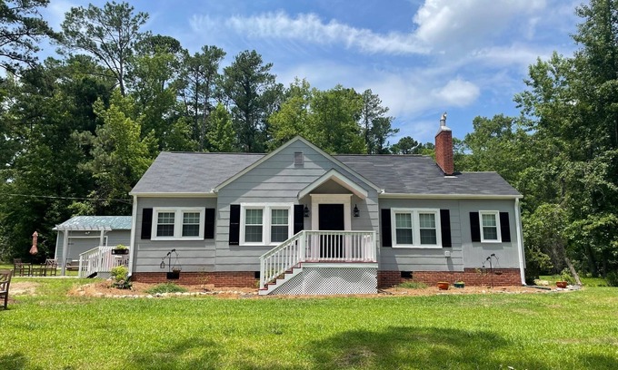 New Hill House | Private, cozy cottage, and beautiful country setting surrounded with pine trees.