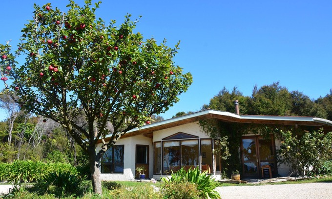 Collingwood Cabin | Private retreat for groups in stunning native bush with sea views.