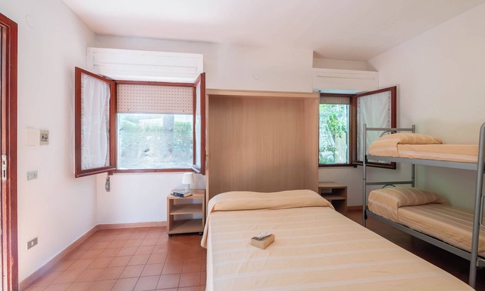 Grotta dell'acqua Resort | Property In A Holiday Village 'Monolocale 3 Posti Letto' with Shared Pool and Air Conditioning