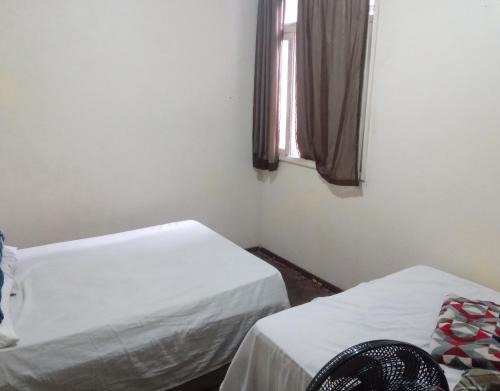 Nazareth House | Quarto com vista pra Piscina