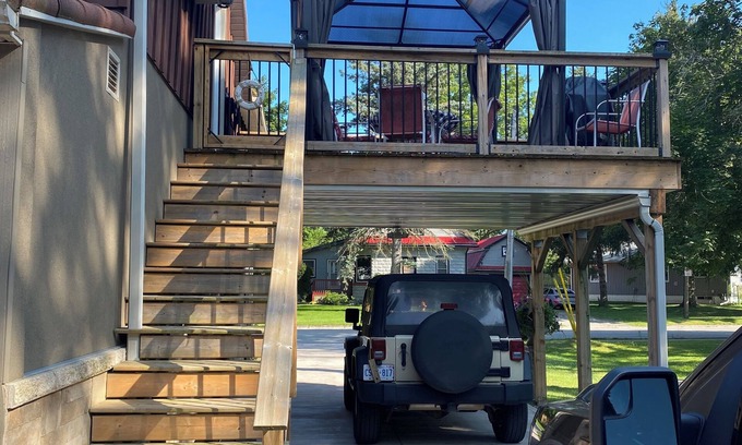Port Burwell Apartment | Quick walk to the beach, or launch a Kayak or Canoe right out back.