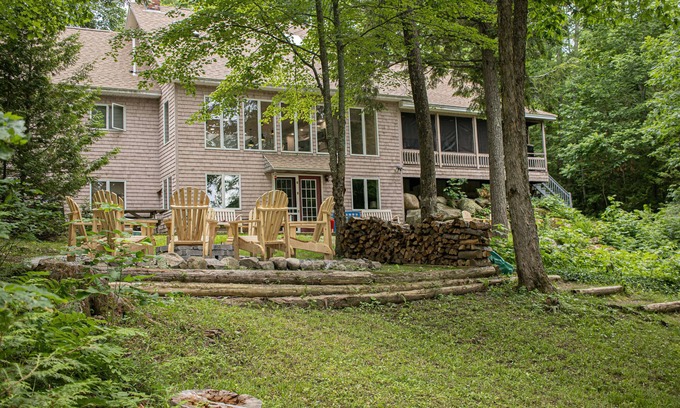 Oakland House | Quiet, 6 bedroom 4 bath Lakefront home, private sandy beach, near Colby College
