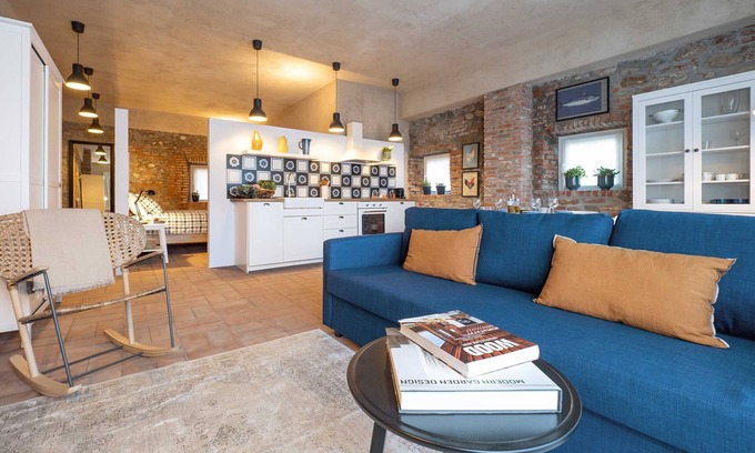 Cressa Apartment | Quiet Apartment with Garden in Restored Farmhouse