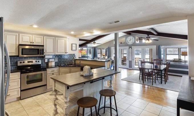 Roach House | Quiet Lakefront House- Family retreat w/calm water, water toys & large swim dock
