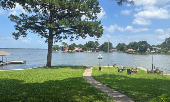 Tool House | Quiet neighborhood with a beautiful lake view. Brand new dock.