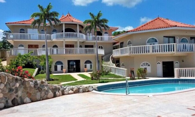 Epworth Villa | Quiet oceanfront suite with private balcony at Rockcliff. Minutes to Ocho Rios