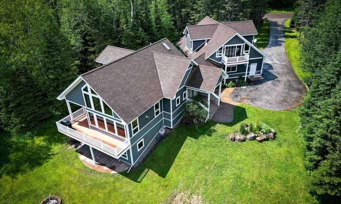 Two Harbors House | Rare large contemporary four bedroom home with forest and lake views + EV Charge