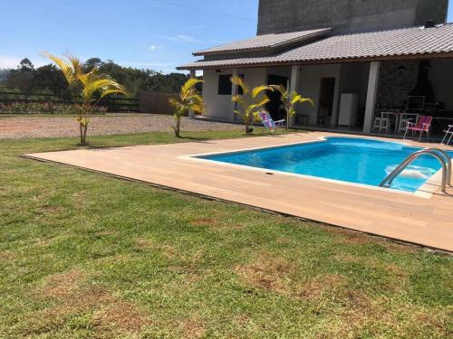 Extrema House | Recanto do sol