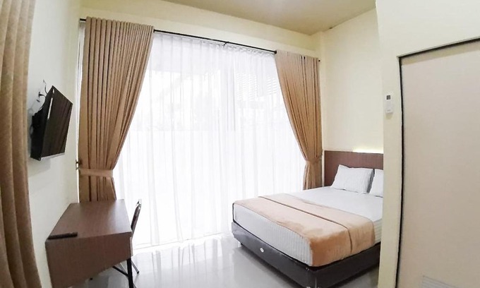 Jambi Hotel | RedDoorz Syariah near Transmart Jambi 2