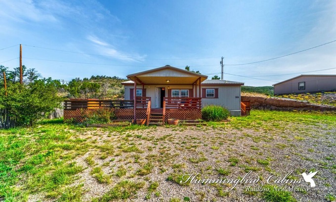 Ruidoso Downs House | Redman! A single level, cozy cabin on a hill with a direct view of the Ruidoso Downs Racetrack!