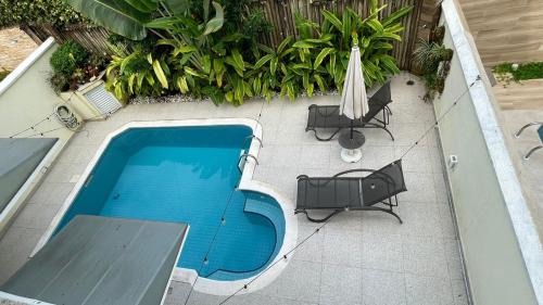 Juquehy House | Refúgio em Juquehy no centro a poucos metros do mar com piscina privativa aquecida