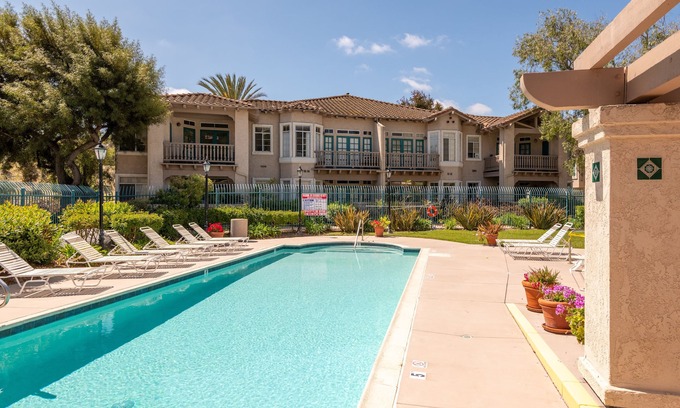 Mira Costa Condo | Relax and Recharge in our 2BR/2BA Condo with Free Wifi and Pool - Perfect for Work or Play!