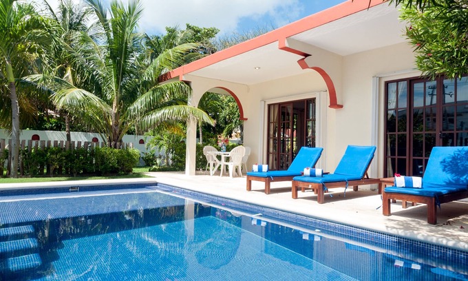 Puerto Morelos House | Relax by the sparkling pool and enjoy the ocean breeze.