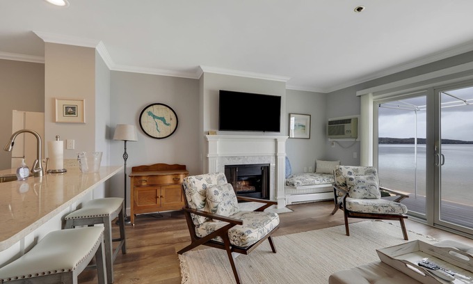 Boyne City Condo | Relax & Unwind | Lake Charlevoix Views | Private Patio + Beach | Fireplace |