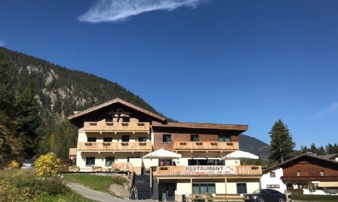 Biberwier Apartment | Relax wonderfully and into an apartment with a view of the slopes/mountains.