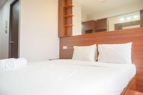 Depok Apartment | Relaxing and Homey Studio Transpark Cibubur Apartment By Travelio