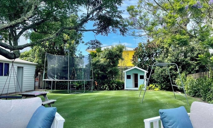 Papamoa Beach House | Relaxing Haven For Families With Spa - minutes walk to the beach, shops & dining