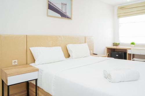 Ciputat Apartment | Remarkable Studio at Baileys City Apartment By Travelio
