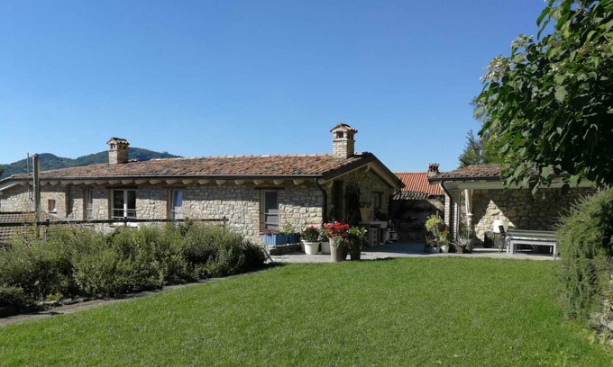 Ponte Nizza House | Renewed old stone house of 240 squared meters with porches garden and woods