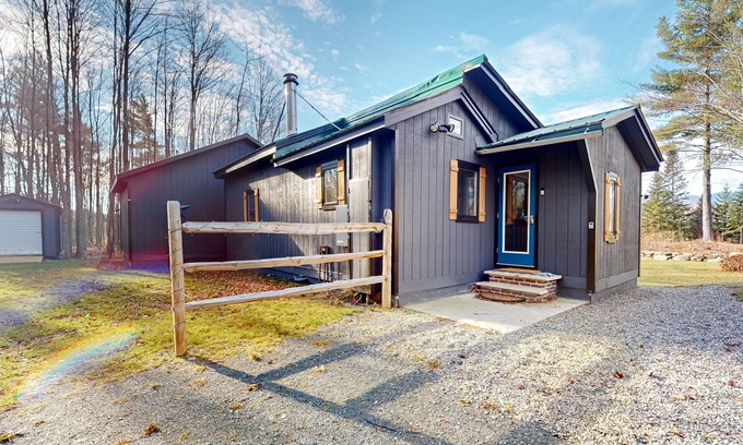 North Troy Cabin | Renovated historic cabin with mountain views, lake access, & electric fireplace