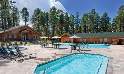 Pinetop House | Resort 1BD condo with amenities of pool, arcade, walking trails and more
