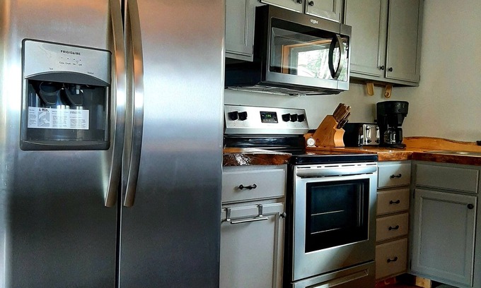 Winter House | River retreat with excellent fishing & kayaking from dock.