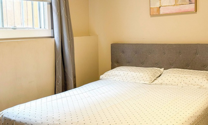 Sunnyside House | Riverfront Comfort: Basement Room for Rent