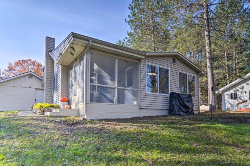 Grayling House | Riverfront Grayling Retreat with Fire Pit and Dock!