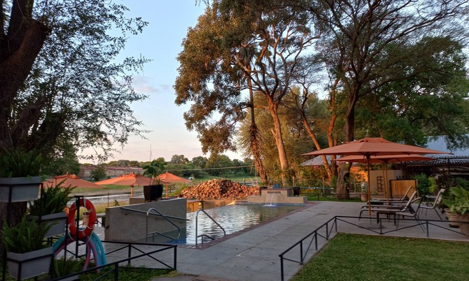Maun Cottage | Riverside Splash- Stylish and Cozy Cottages by the River bank