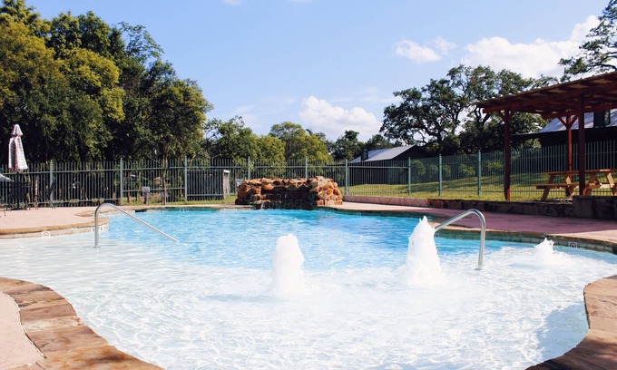 Leakey Cabin | Romantic Cabin Water View over hangs slightly on the cliff of The Springs.