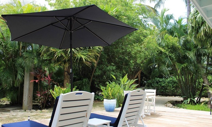 Islamorada House | Romantic Garden View Studio Cottage Nestled in Lush Landscaping with Pool and Dockage located on .