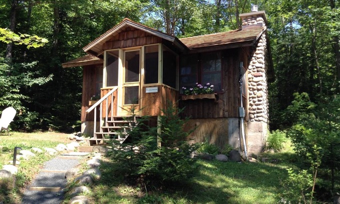 Drummond Cabin | Romantic Log Cabin Nestled in Wooded Setting on Lake Wilipyro