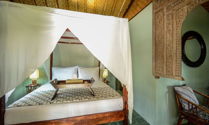 Jasri Resort | Romantic Private Villa facing the pool.Soft aqua handmade tiles and antiques.