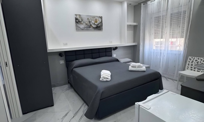 Monte Po-Nesima-San Leone-Rapisardi Apartment | Room 'Dolce Relax - Deluxe' with Balcony, Wi-Fi and Air Conditioning