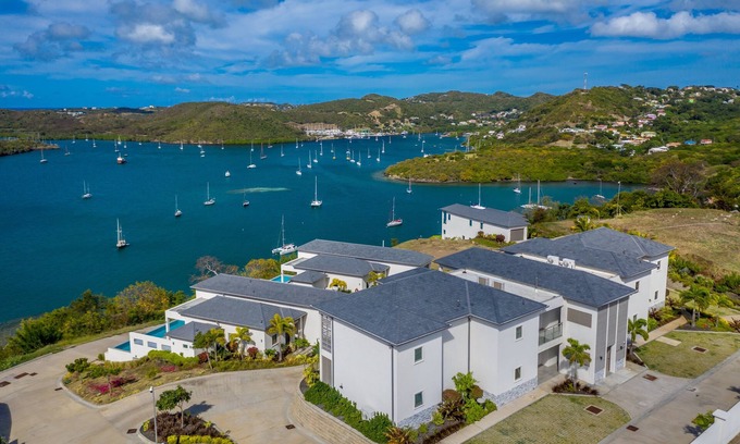 Calvigny Condo | Rose Quartz - 2 Bedroom Luxury Suite with Ocean and Pool Views