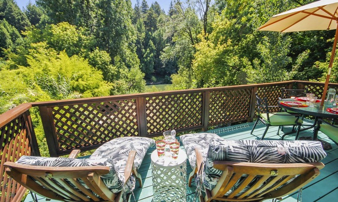 Guerneville Cabin | Roskamp ~ Riverfront Cabin with Large Yard, Seasonal River Dock & Boats