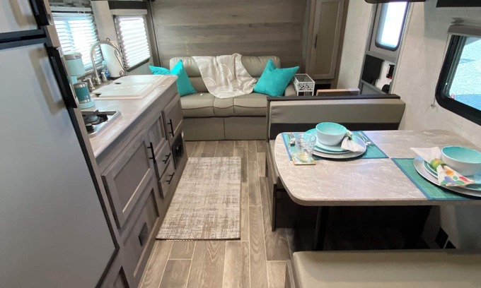 Siler City RV Rental | Rural NC GLAMPING to experience off the grid camping! Privacy & pond plus more!
