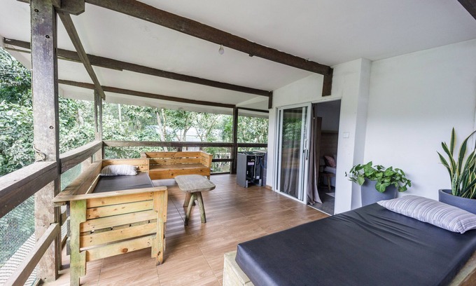 Aburi Bed & Breakfast | Rustic and unique private room with large wraparound balcony up in the Trees!