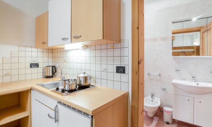 Colfosco Apartment | Rustic Apartment near Ski Areas with Wi-Fi, Garden and Terrace