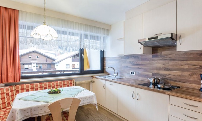 Colfosco Apartment | Rustic Apartment near Ski Areas with Wi-Fi, Garden and Terrace