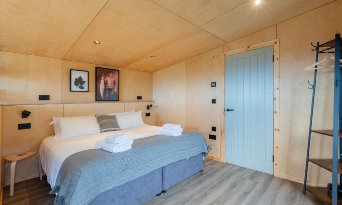 St. Andrews House | Rustic Cabins, sea views from rewilded farm with Highland Cows