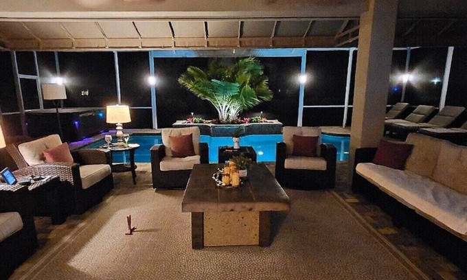 Rural Estates House | Saltwater pool/spa, lanai w firepit & TV.nGolf, tennis, bocce, health facilityn