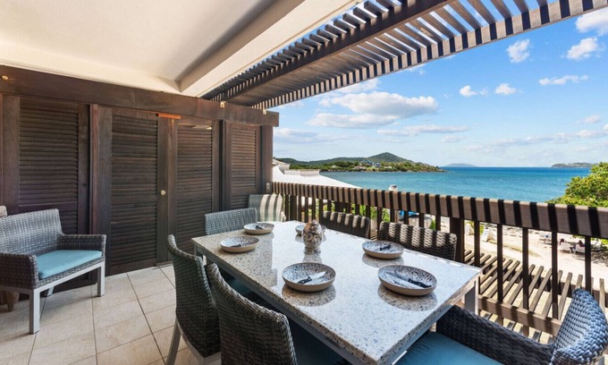 Cabes Point Apartment | Sapphire Dreams: Premier Beachfront Elegance in Building A of The Sapphire Beach Resort