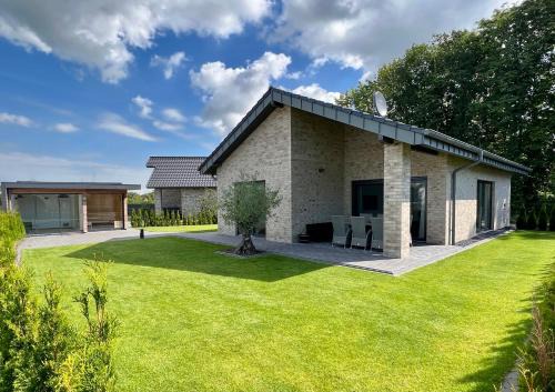 Barssel House | Schönes Ferienhaus mit Sauna am Harkebrügger See in der Nähe von Oldenburg