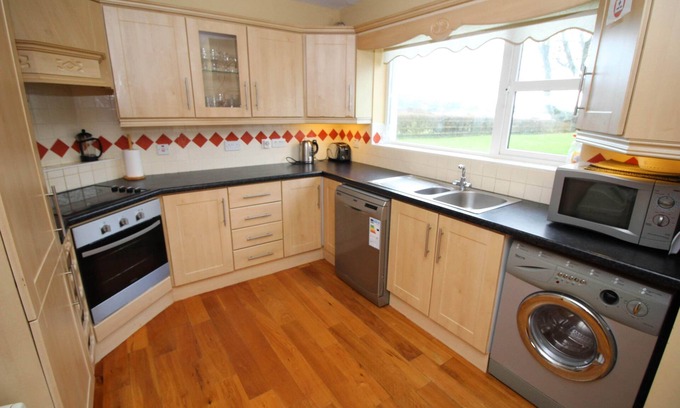 Rathmullan House | Seabreeze cottage with direct sandy beach access from this cottage from garden