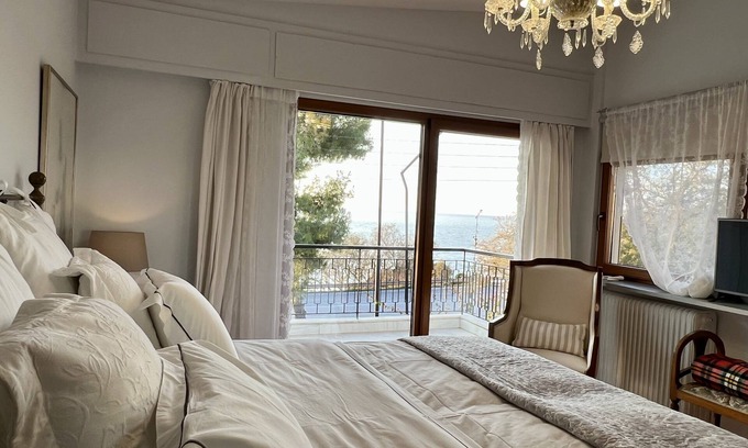 Saronida Villa | Seafront villa, 170sqm, 1min away from a sandy, almost privatenbeach! n