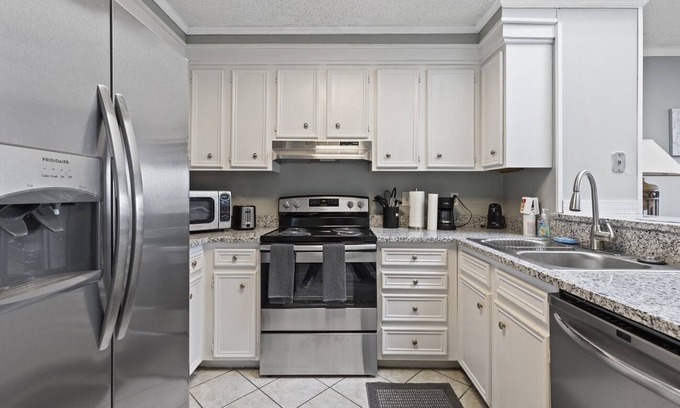 Ocean Drive Condo | Second Row in North Myrtle Beach. Steps to the ocean. Pool and hot tub!