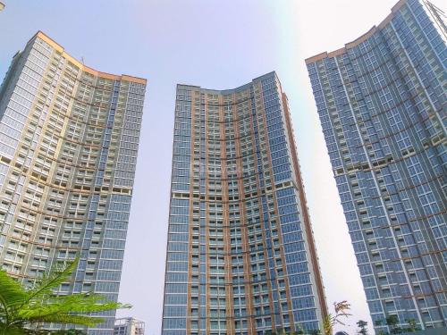 Pantai Indah Kapuk Apartment | Serene and Best Location 2BR Gold Coast Apartment By Travelio